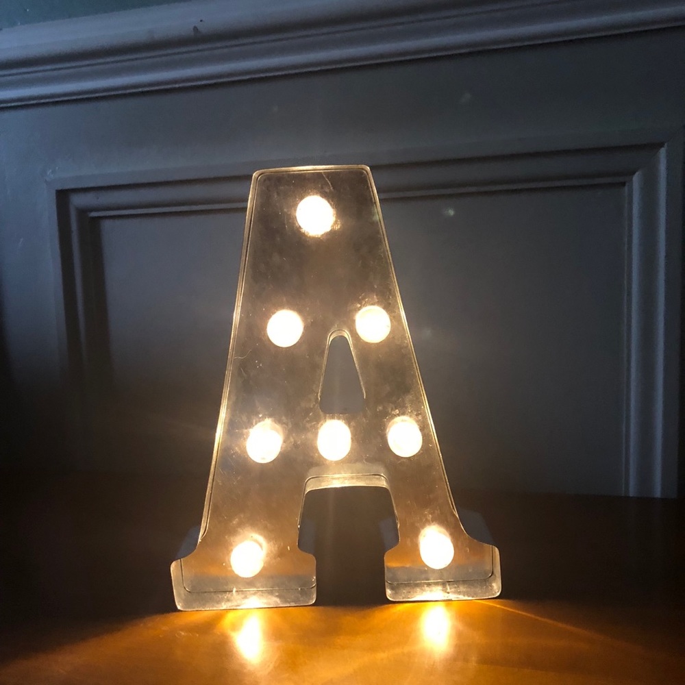 Light up silver A sign aprox 10”x7”